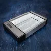 A toaster is placed on a dark, textured surface. Anteprima dell’immagine prodotto