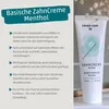 A product shot of toothpaste with accompanying marketing text. Produktbild-Vorschau