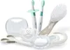 A collection of baby care items, including toothbrushes, a pacifier, a brush, scissors, and a case, arranged on a white background. Produktbild-Vorschau