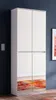 A white wardrobe with mirrored doors reflecting a colorful rug. Produktbild-Vorschau