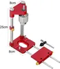 A red and silver drill guide locator for woodworking. Náhled obrázku produktu