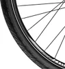 A close-up view of a bicycle wheel, showing the tire and spokes. Produktbild-Vorschau