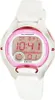 A close-up, front-facing studio shot of a Casio digital watch with a white band and pink accents. Produktbild-Vorschau