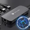 A close-up of a USB-C hub with a magnified view of its internal circuitry. Produktbild-Vorschau