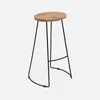 A single bar stool with a wooden seat and black metal legs against a white background. Anteprima dell’immagine prodotto