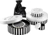A collection of Thomas Sabo charm club jewelry boxes and pouches, with a pearl bracelet inside one of the open boxes. Produktbild-Vorschau