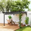 A backyard patio scene with a pergola, chairs, and plants. Náhľad obrázku produktu