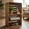 Two wooden crates stacked on a wooden floor, decorated with household items. Náhled obrázku produktu