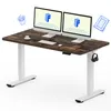 A standing desk with two monitors, a keyboard, mouse, and headphones. Voir les images du produit