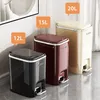 Three pedal trash cans of different sizes and colors are displayed side-by-side. Produktbild-Vorschau