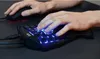 Hands using a gaming keyboard and mouse. Podgląd zdjęcia produktu
