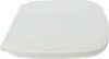 A white toilet seat is shown from a slightly elevated side angle against a white background. Náhled obrázku produktu