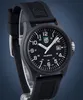 A close-up studio shot of a black Luminox watch with a black rubber strap against a dark blue background. Voir les images du produit