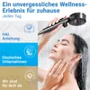 A woman is showering with a handheld showerhead. Produktbild-Vorschau