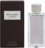 A bottle of Abercrombie & Fitch First Instinct Eau de Toilette for Men and its packaging are displayed side-by-side against a white background. Náhľad obrázku produktu