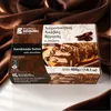 Kandylas Halva Schokolade 400 g Packung auf braunem Glanzstoff Produktbild-Vorschau