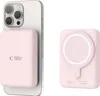 A pink magnetic power bank is shown attached to the back of a silver smartphone, and also separately. The power bank has a circular magnetic charging area. Náhled obrázku produktu