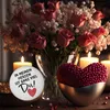 A romantic still life with roses, candles, and a heart-shaped decoration. Produktbild-Vorschau