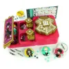 A Harry Potter themed badge-making kit is displayed on a white background, with various accessories and decorative elements scattered around. Produktbild-Vorschau