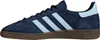 A side profile of a single Adidas Handball Spezial shoe. Voir les images du produit