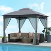 A gazebo set up next to a swimming pool with outdoor furniture inside. Náhled obrázku produktu