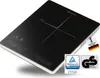 A black induction cooktop with white markings and controls, set against a white background. It has certification badges and a German flag tag attached. Náhľad obrázku produktu