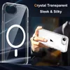 A person is holding a clear phone case with a magnetic ring on the back, showcasing its transparency and sleek design. The background is dark and abstract, with streaks of light suggesting movement or speed. Produktbild-Vorschau