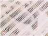 A close-up view of a white mesh fabric with a diagonal striped pattern. The mesh has small, hexagonal openings arranged in rows. Náhľad obrázku produktu