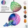 A collage of 3D printed dragon eggs with dragons emerging, showcasing various color options and a gradient color swatch. Produktbild-Vorschau