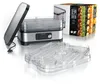 A food dehydrator with its accessories and packaging, presented on a white background. Produktbild-Vorschau