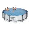 A family is enjoying a swim in an above-ground pool. Produktbild-Vorschau