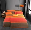 A neatly made bed with a colorful bedding set in a room. Anteprima dell’immagine prodotto