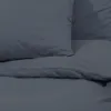 A close-up view of a dark gray duvet cover and pillowcase. Náhľad obrázku produktu