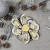 A festive table setting with oysters and festive decorations. Voir les images du produit