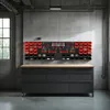 A workshop or garage setting with a workbench and tool organization system. Náhled obrázku produktu