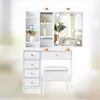 A white vanity table with a mirror and stool, set against a blurred background. Voir les images du produit