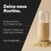 A close-up of a supplement capsule with powder spilling out, next to text highlighting product benefits. Produktbild-Vorschau
