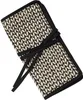 A closed roll-up case for knitting needles with a leaf pattern. Produktbild-Vorschau