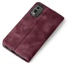 A burgundy flip case for a smartphone is shown against a white background. Produktbild-Vorschau