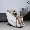 A massage chair is shown in a room with a sofa and a dresser in the background. Produktbild-Vorschau