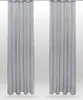 Two gray sheer curtains hanging side-by-side against a light gray background. Anteprima dell’immagine prodotto