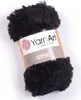 A ball of black yarn with a label. Produktbild-Vorschau