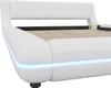A close-up side view of a white bed frame with integrated blue LED lighting. Náhled obrázku produktu