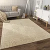 A living room scene with a rug, sofa, and shelving unit. Anteprima dell’immagine prodotto