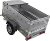 A silver utility trailer with a gray tarp cover, shown from a high angle. Podgląd zdjęcia produktu