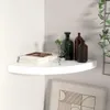 A white corner shelf with decorative items. Produktbild-Vorschau