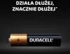 A Duracell battery is shown against a dark background with promotional text above. Voir les images du produit