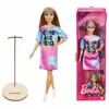 Barbie modella - Femme e vestito feroce GRB51 Anteprima dell’immagine prodotto 13