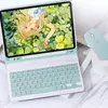 A light blue tablet case with a keyboard and a light blue mouse are displayed on a marble-like surface. Náhľad obrázku produktu