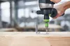 A person is using a drill to screw a metal bracket onto a wooden beam. Náhled obrázku produktu
